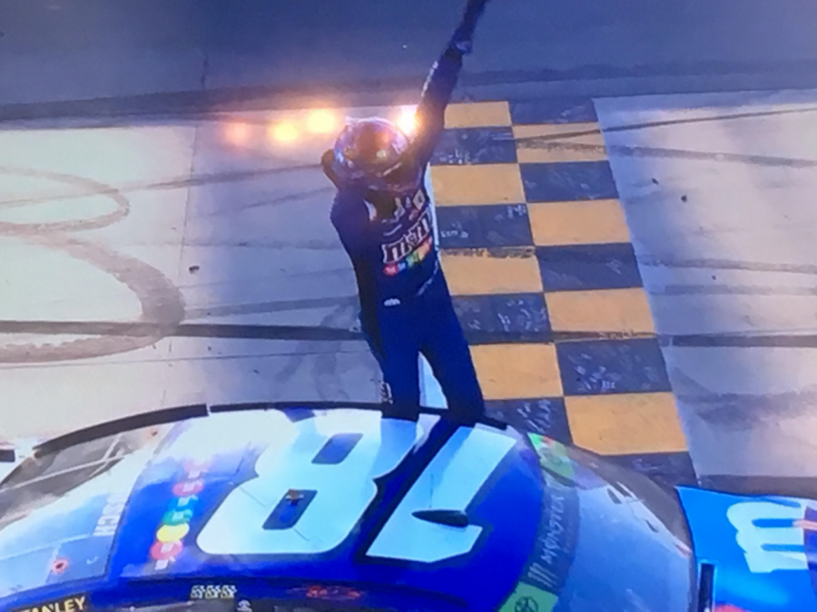 Busch celebrating his win at Dover