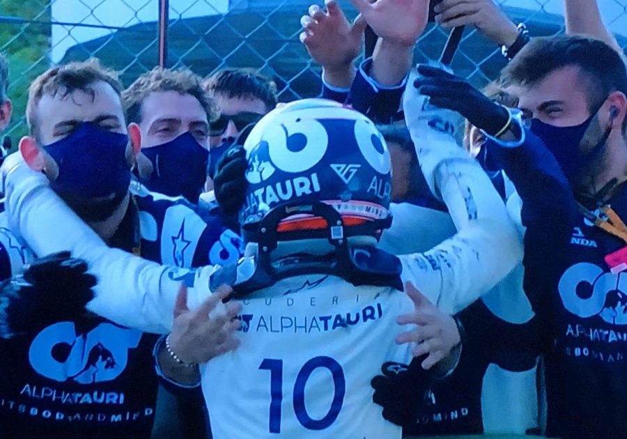 Gasly celebrates with his team after his shocking Italian GP victory