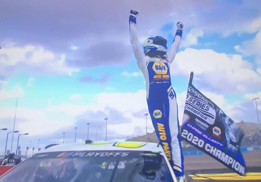 Chase Elliott celebrates after claiming his first championship